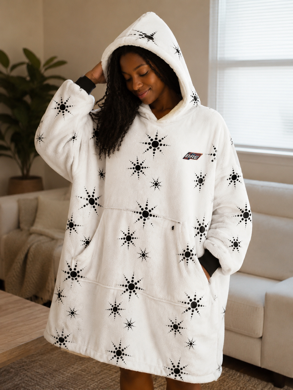 Starburst Hooded Blanket – Cozy White Sherpa Wearable Blanket with Black Snowflake Pattern